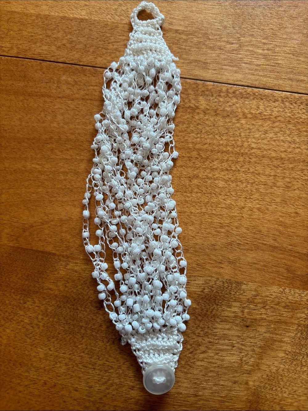 White beaded knit bracelet